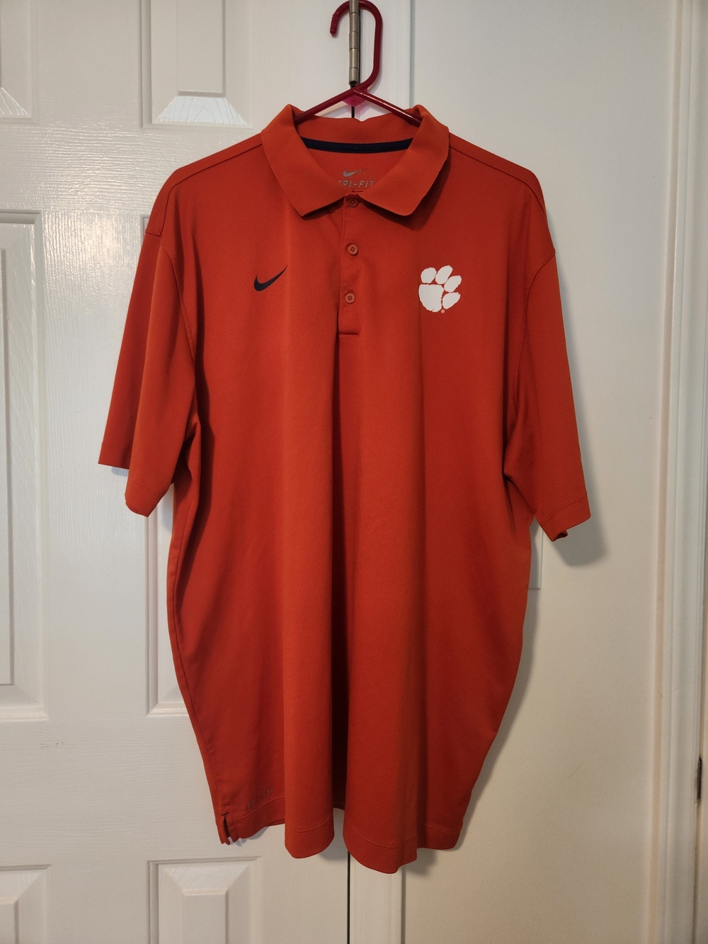 Nike Orange Polo with White Paw and Black Swoosh